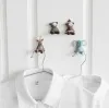 Small animal resin socket, power cord hook, storage rack, strong adhesive hook, plug adhesive bracket Application Scenario